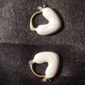 Heart shaped snuggie earrings sterling silver with gold wash.